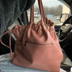 This hospital boutique bag is large & soft!One small knick outside. See pictures